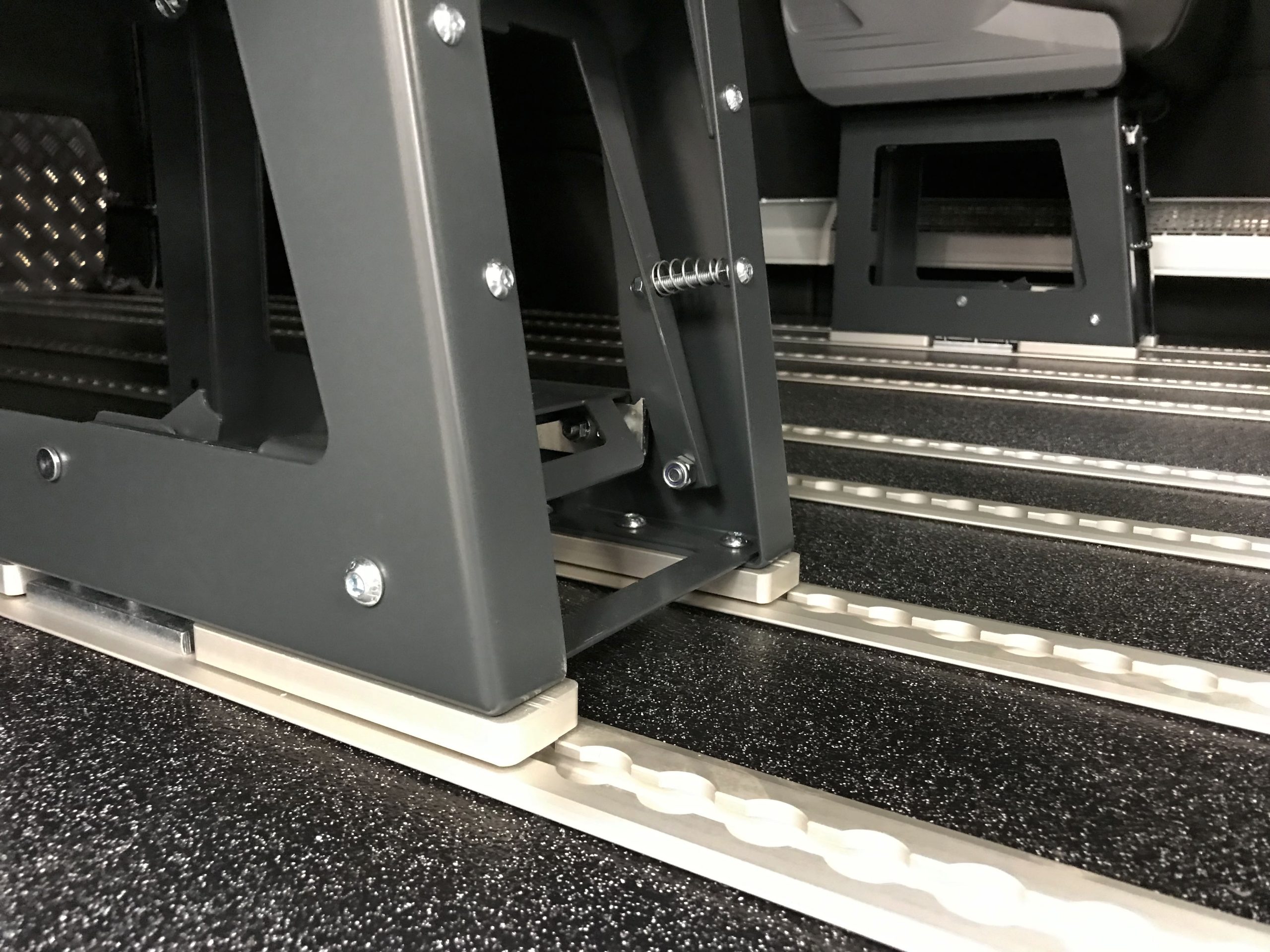 Bus seat base